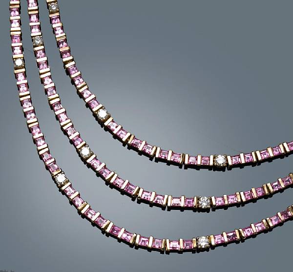 Appraisal: A pink sapphire and diamond necklace designed as a triple-swag