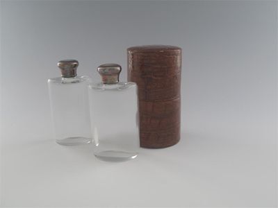 Appraisal: A late Victorian cased pair of cologne bottles one with