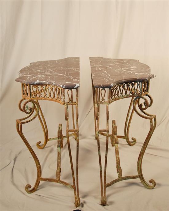 Appraisal: A Pair of Marble Topped Wrought Iron Console Tables the