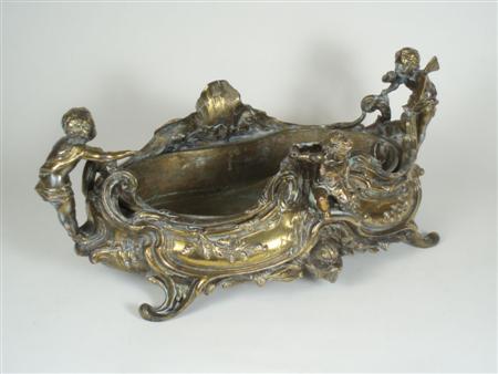 Appraisal: A th century gilt metal rococo style jardiniere of shaped