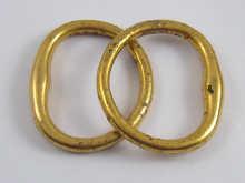 Appraisal: A pair of gilt bronze bangles probably ancient