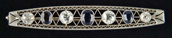 Appraisal: SAPPHIRE AND DIAMOND PIN Elegant kt white gold bar pin