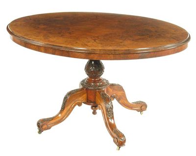 Appraisal: A Victorian walnut and burr walnut breakfast table the quarter