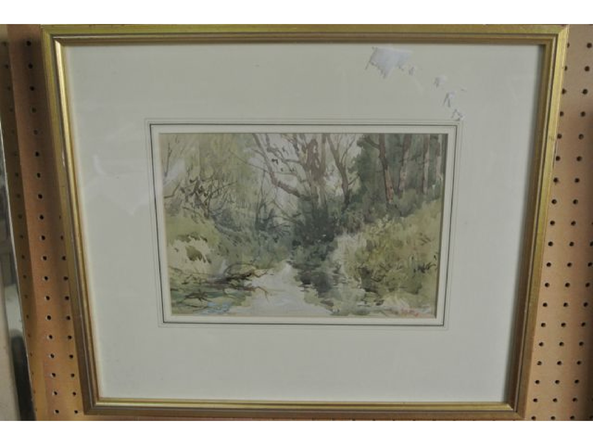 Appraisal: An early th century watercolour of a woodland stream signed