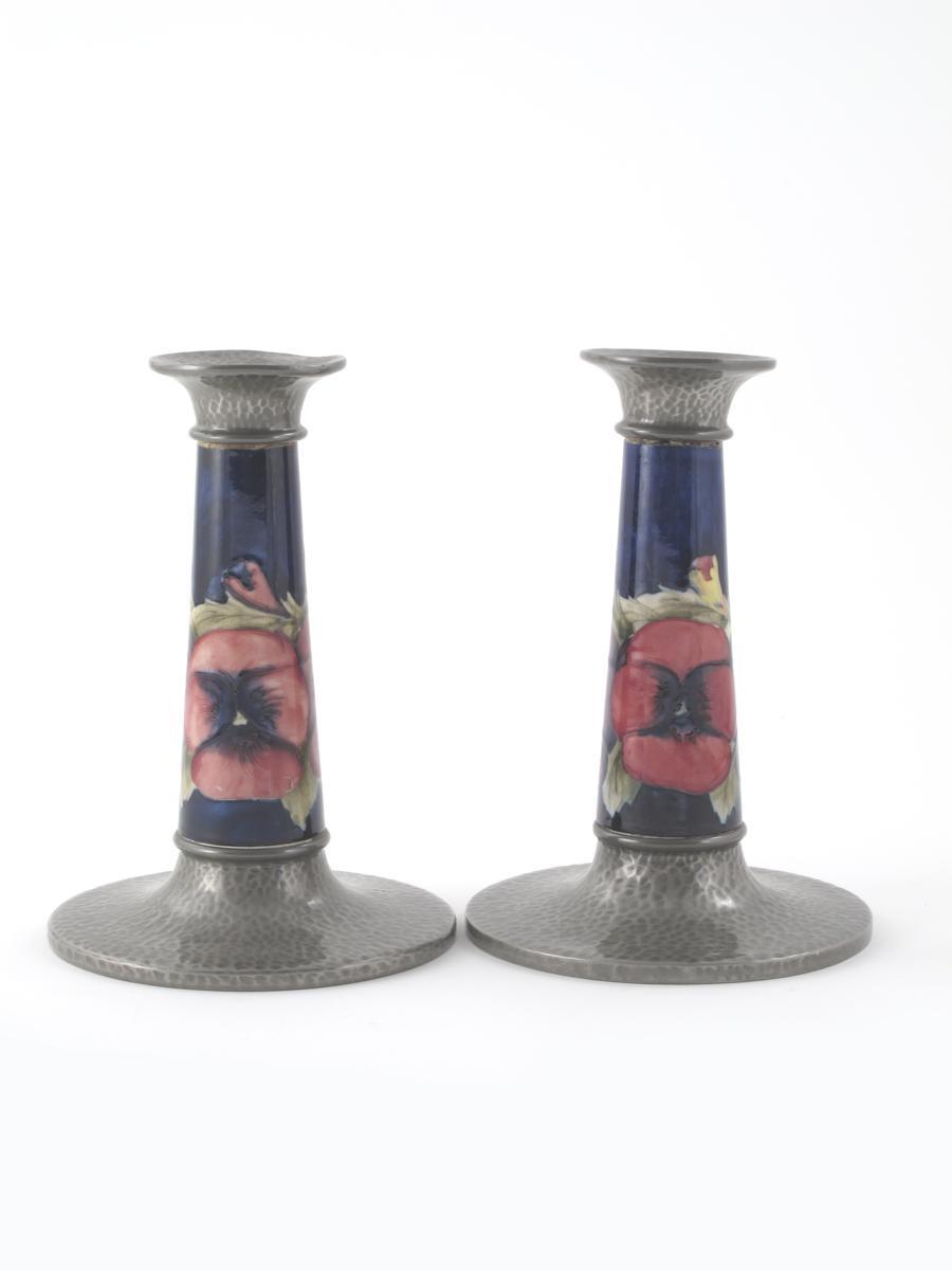 Appraisal: Pansy a pair of Moorcroft Pottery candlesticks with Liberty