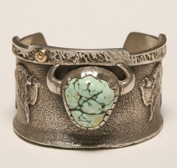 Appraisal: Santo Domingo Pueblo silver bracelet with large natural turquoise stone