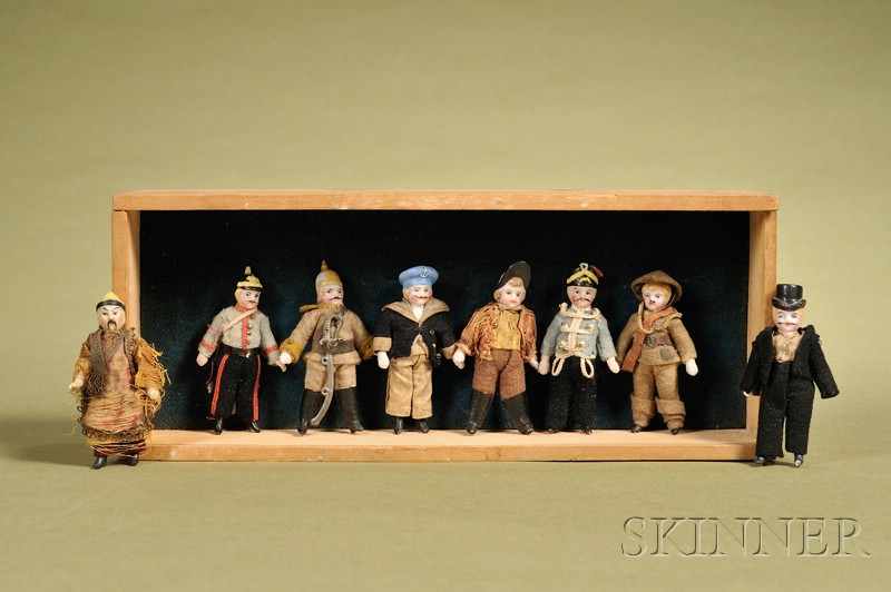 Appraisal: Eight Small Bisque Gentlemen Figures in Shadowbox Germany c eight