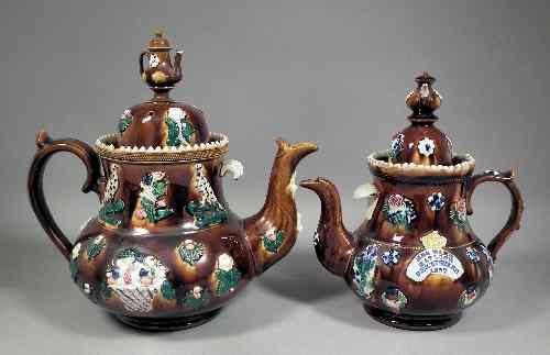 Appraisal: A th Century Staffordshire brown treacle glazed ''Barge'' ware teapot