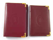 Appraisal: A Cartier red leather pocket wallet and matching notepad diary