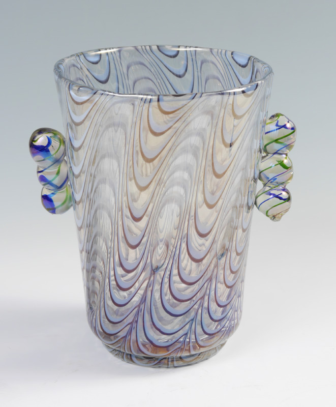 Appraisal: BOHEMIAN ART GLASS HANDLED VASE Attribution it Loetz ribbed body