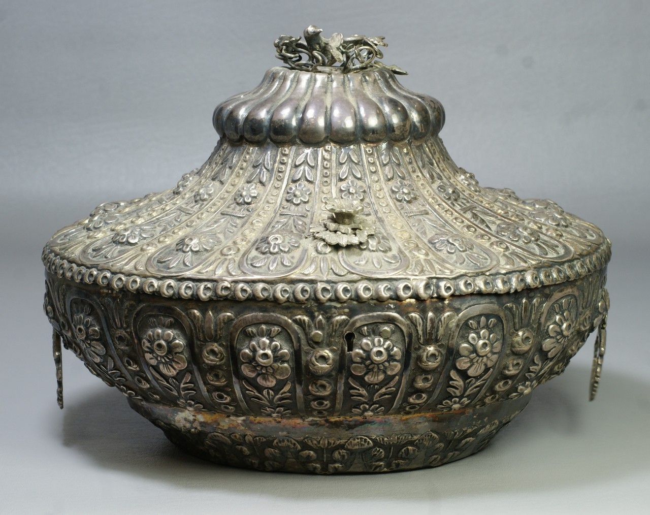 Appraisal: Unmarked Turkish silver covered box with hinged lid nesting bird