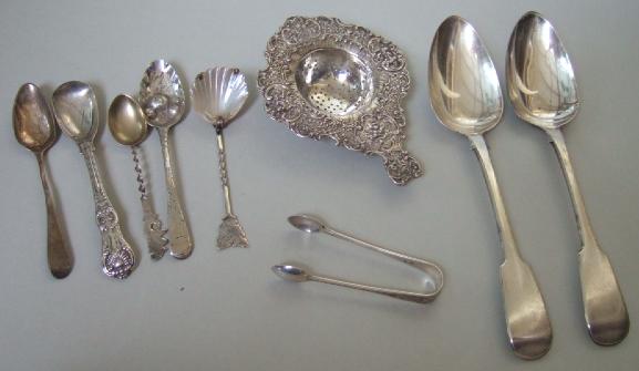 Appraisal: Silver and foreign wares comprising a tea strainer a pair