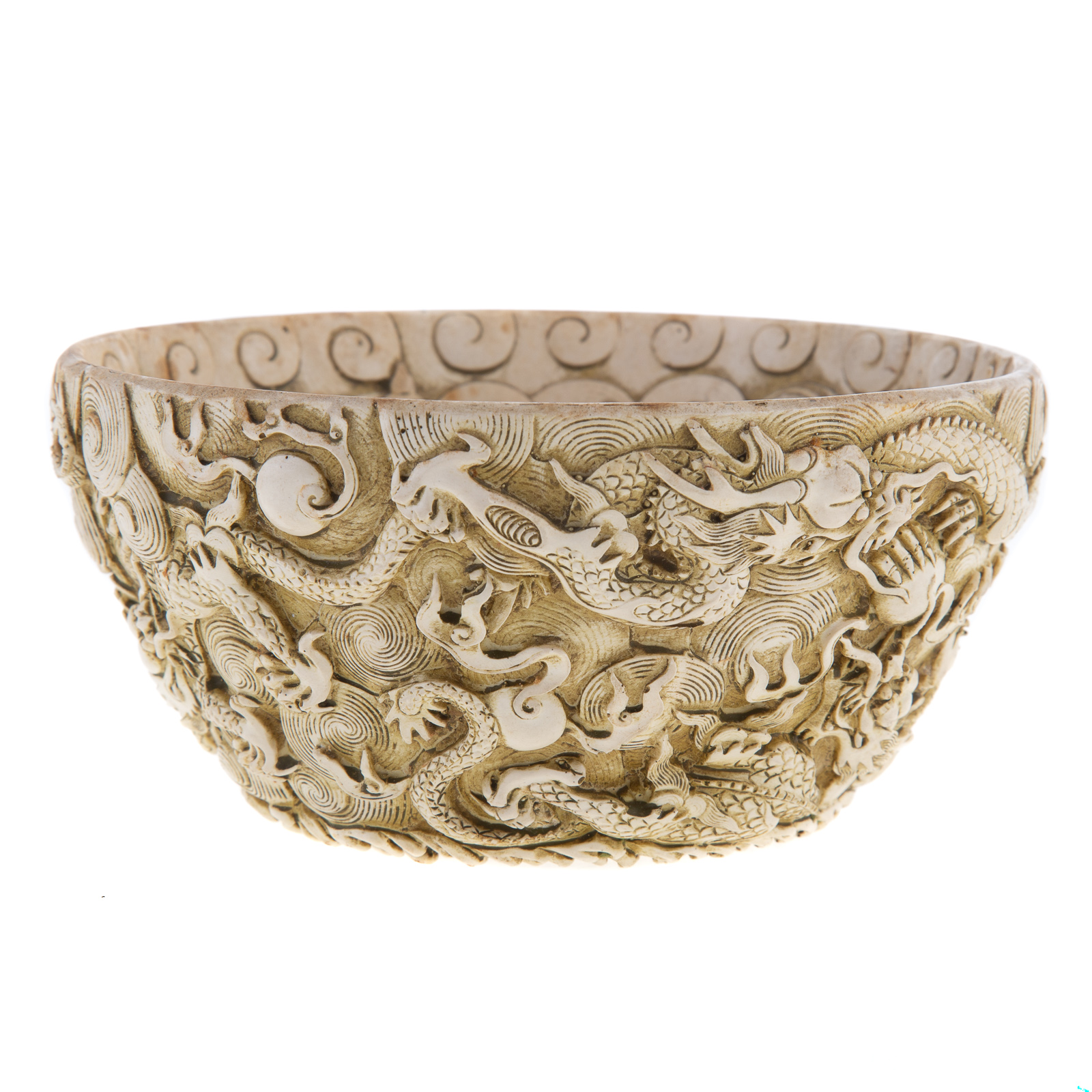 Appraisal: CHINESE WHITE CINNABAR BOWL Late th century elaborately carved dragon