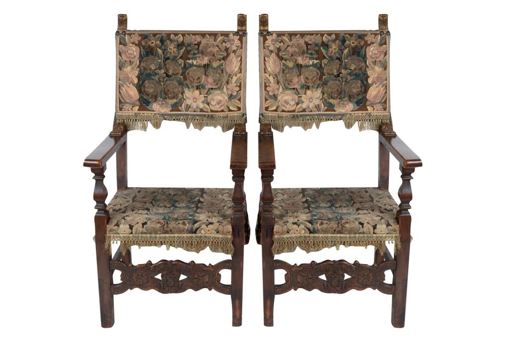 Appraisal: PAIR OF SPANISH REVIVAL STYLE WALNUT ARMCHAIRScovered with tapestry fabric