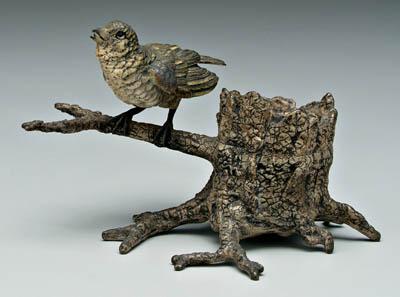 Appraisal: Bronze songbird inkwell formed as perched songbird beside stump base