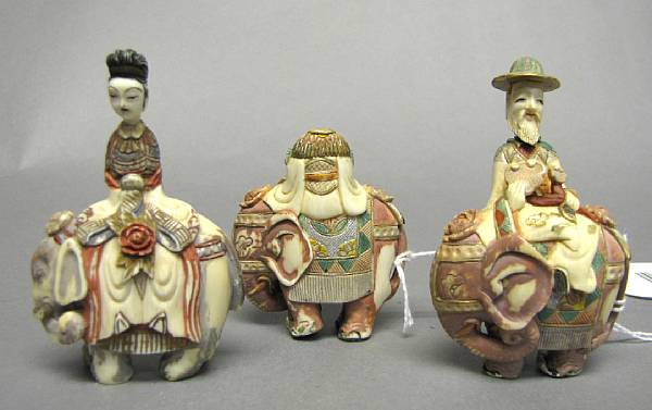 Appraisal: A group of three tinted ivory figural snuff bottles Each