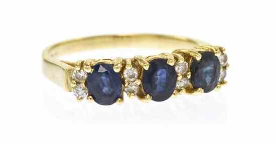 Appraisal: A Karat Yellow Gold Sapphire and Diamond Ring containing three