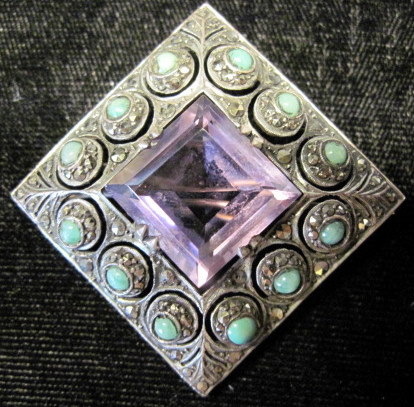 Appraisal: Sterling silver amethyst and turquoise broochgermany