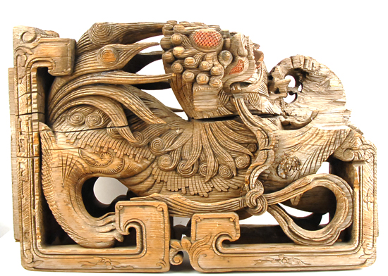 Appraisal: An Asian Wood Sculpture deeply carved and with remnants of