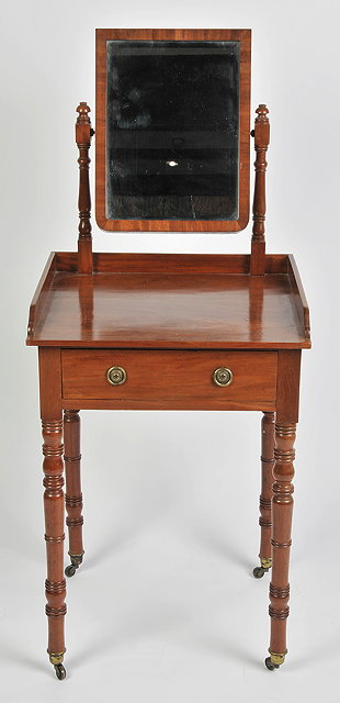 Appraisal: A TH CENTURY MAHOGANY SMALL DRESSING TABLE with swing mirror