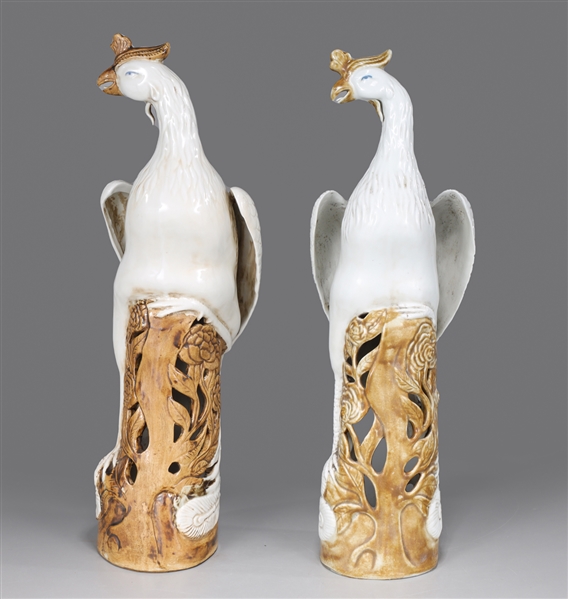 Appraisal: Pair of Chinese white and brown glazed phoenix birds one