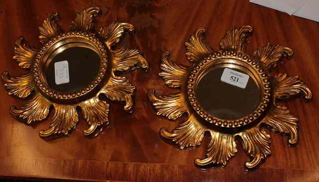 Appraisal: A PAIR OF SMALL CIRCULAR GILT SUNBURST WALL MIRRORS diameter