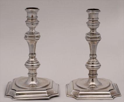 Appraisal: PAIR OF ENGLISH SILVER TABLE CANDLESTICKS IN THE GEORGE I