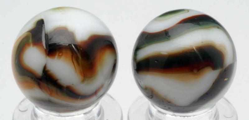 Appraisal: Lot of Peltier Burnt Christmas Tree Marbles Includes one with