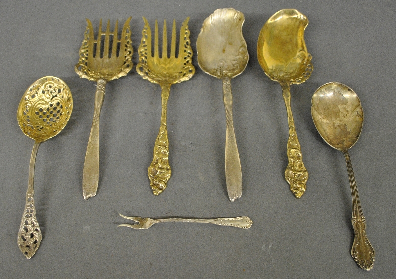 Appraisal: - Seven sterling silver serving pieces some with gold wash