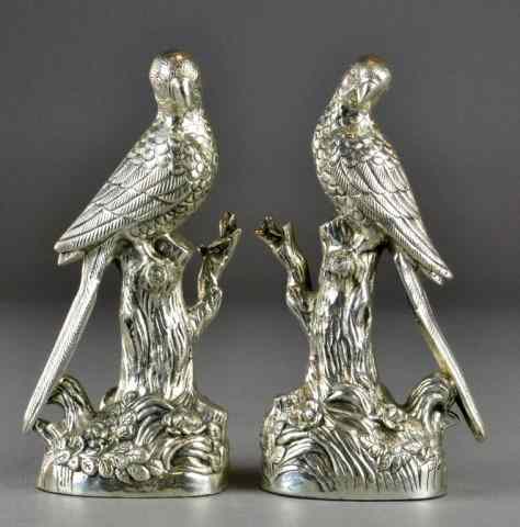 Appraisal: Pcs Antique Silvered Parrot SculptureTo include a pair of weighted