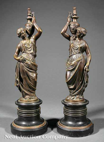 Appraisal: An Antique Pair of French Patinated Bronze Figures of Libation