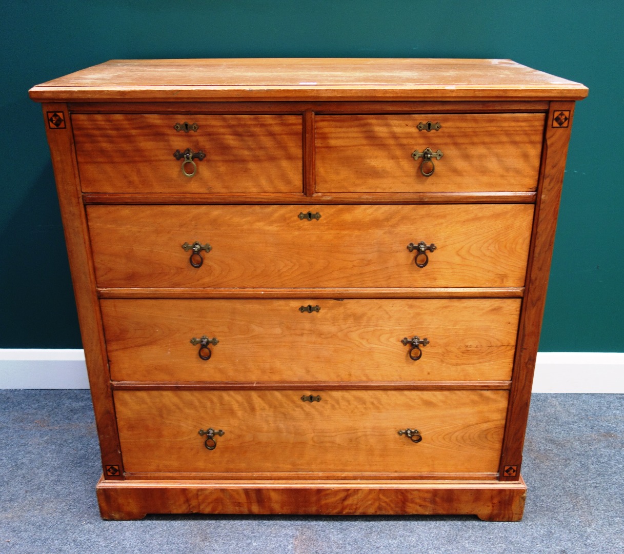 Appraisal: A Victorian inlaid satin birch chest of two short and