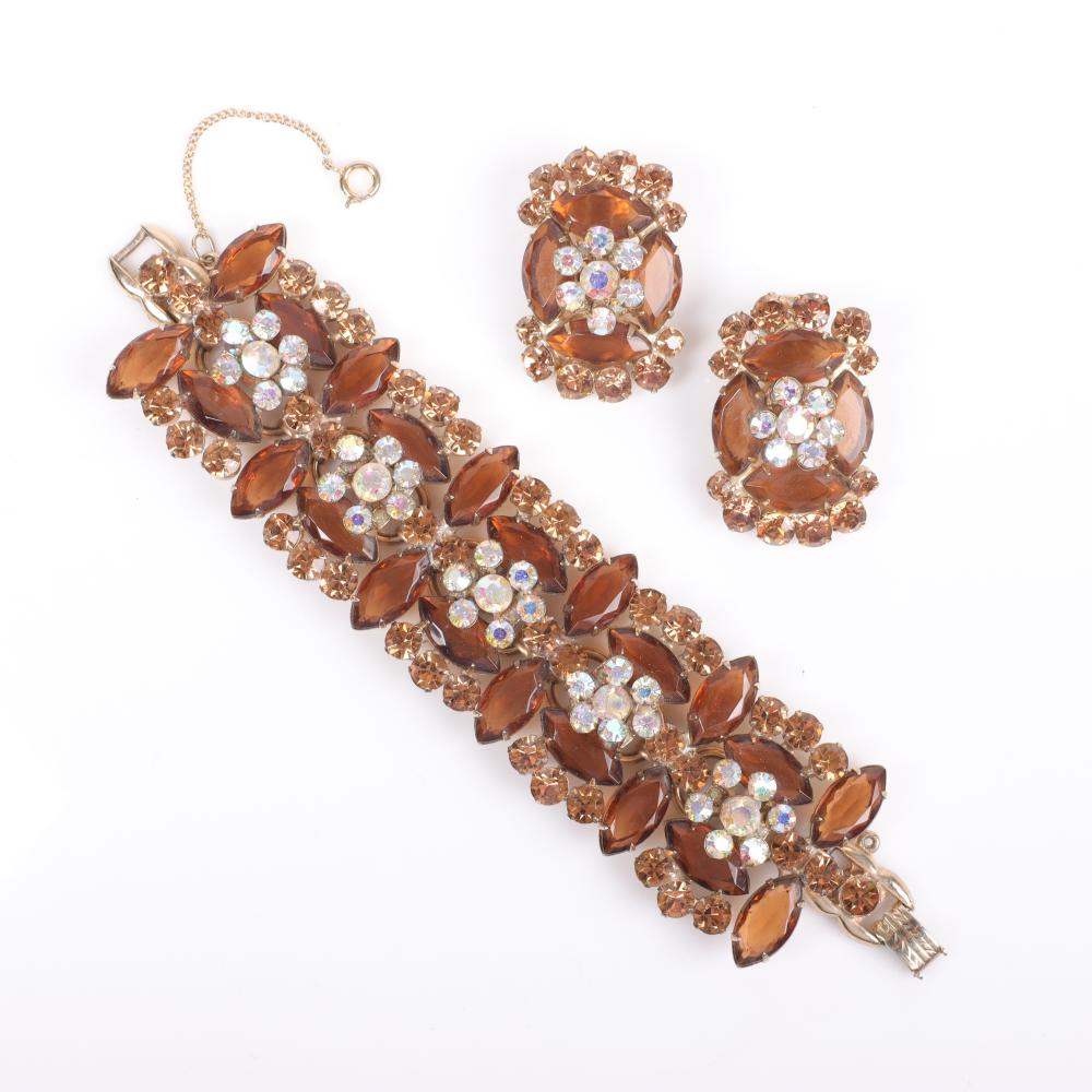 Appraisal: Delizza Elster Juliana jewel encrusted wide link bracelet and button