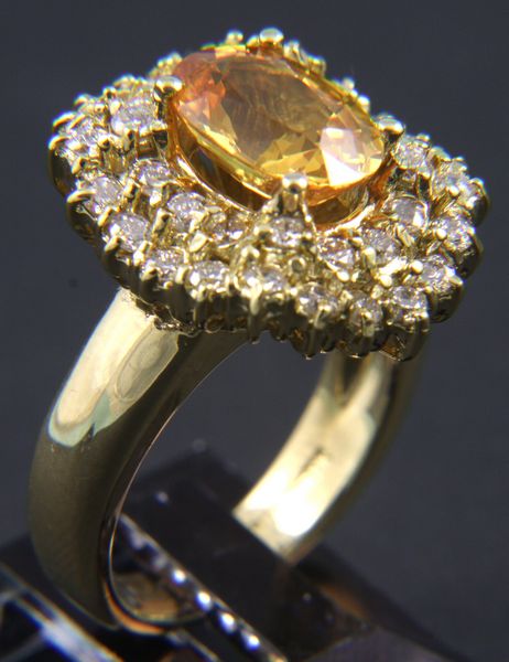 Appraisal: Natural yellow sapphire and diamond ring in k yellow gold