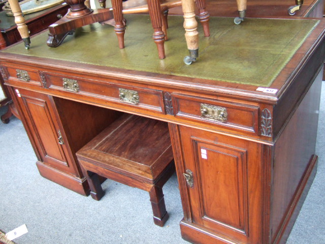 Appraisal: A Victorian walnut pedestal desk the gilt tooled green leather