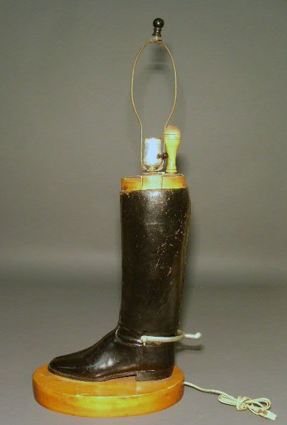 Appraisal: Leather English riding boot lamp h to top of finial