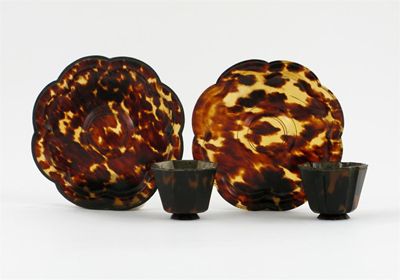 Appraisal: Two Chinese tortoiseshell small octagonal cups each with a metal