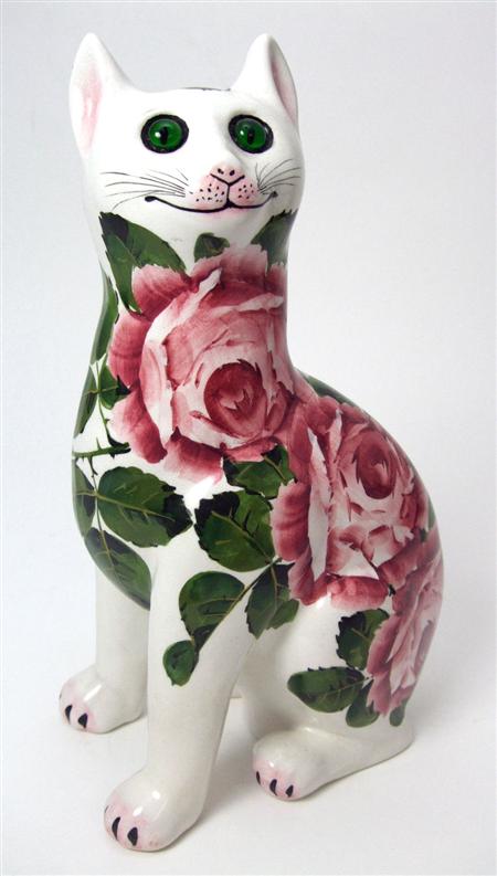 Appraisal: WEMYSS CAT FIGURE POST decorated by Joe Nekola with cabbage