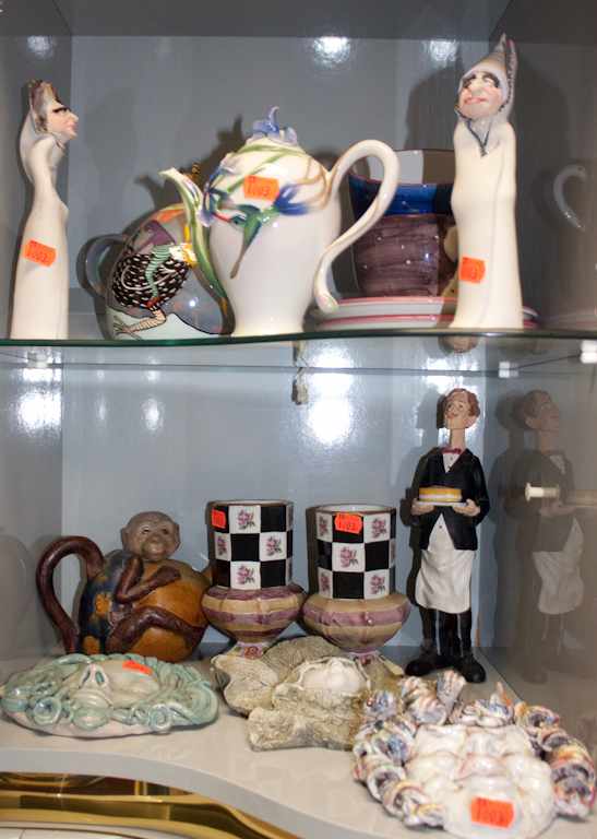 Appraisal: Assorted ceramic articles including figures decorative masks teacups teapot Estimate