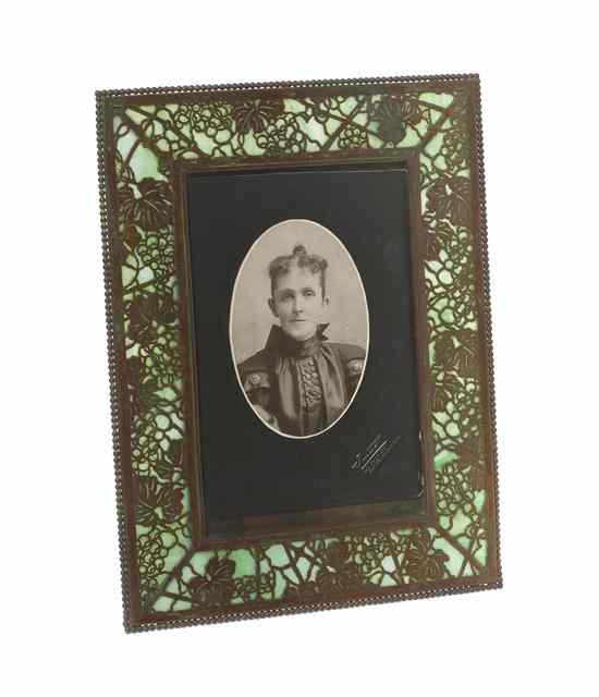 Appraisal: A Tiffany Studios Green Favrile Glass and Gilt Bronze Frame