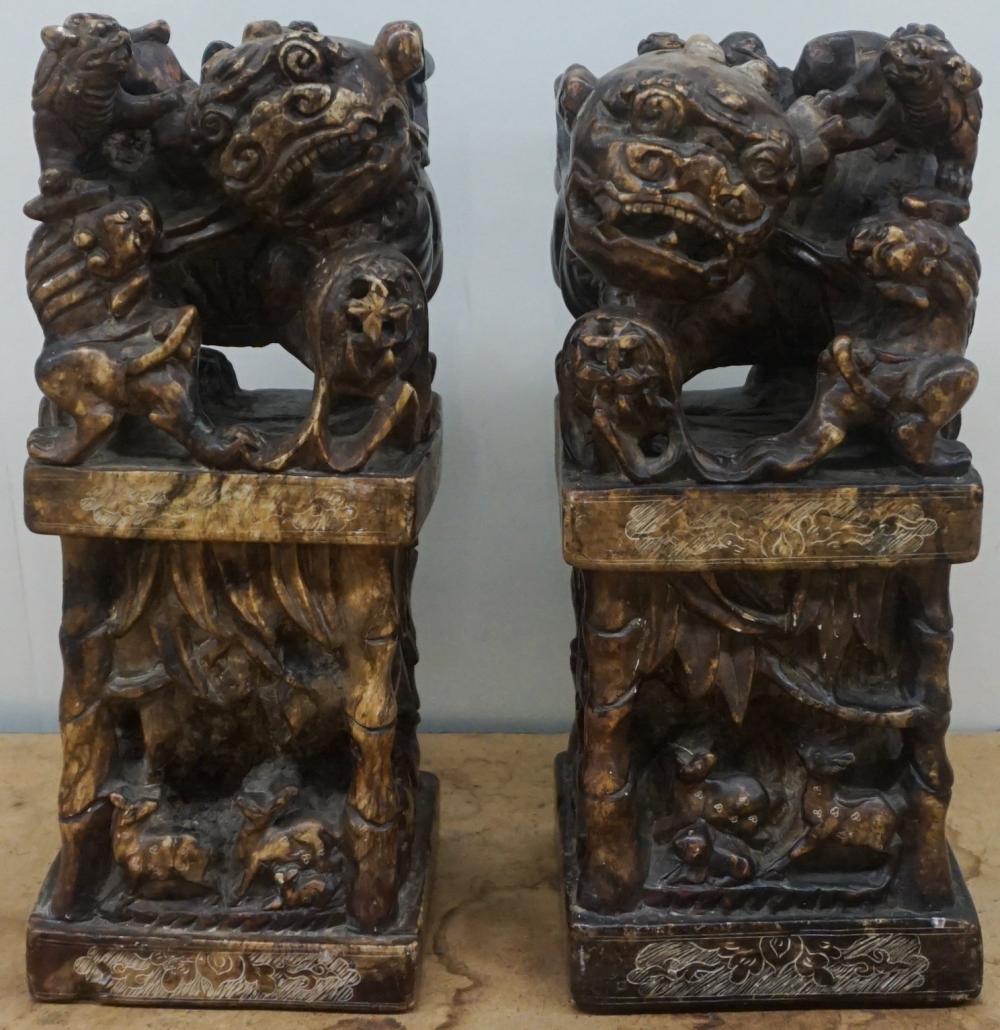 Appraisal: Pair Chinese Carved Stone Foo Dog Family Seals H in