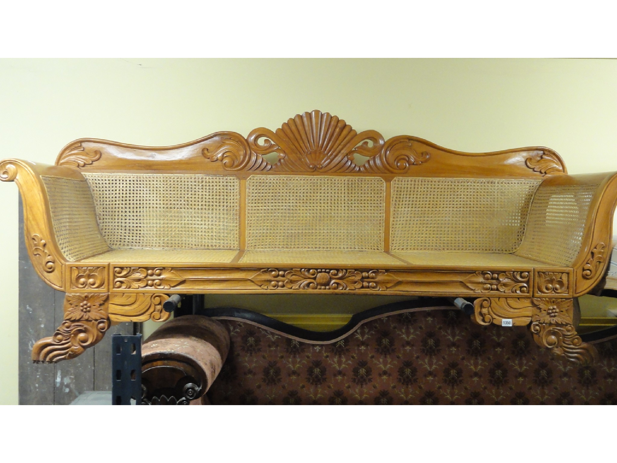 Appraisal: A reproduction three seat sofa in the Regency William IV