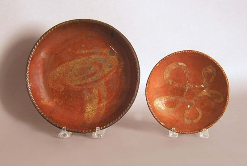 Appraisal: Two redware plates th c dia dia