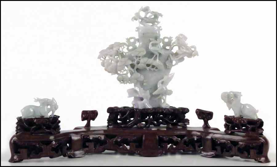 Appraisal: CHINESE CARVED JADE URN Flanked by two carved jade animals