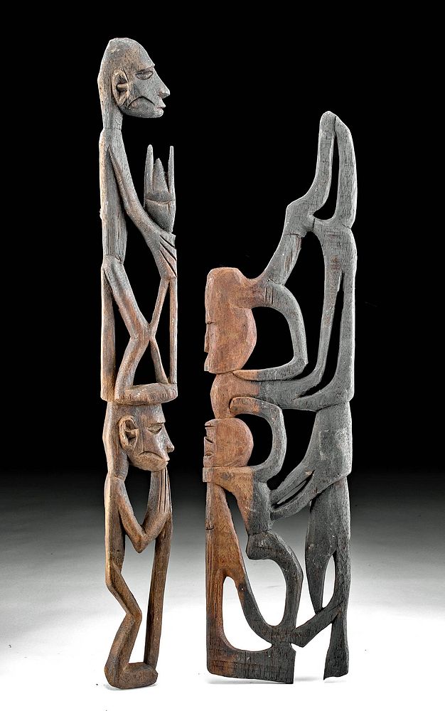 Appraisal: Pair of th C Indonesian Asmat Wood Ancestor Poles Southeast