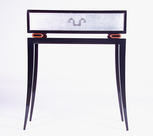 Appraisal: TOMMI PARZINGER CHARAK Ebonized chest-on-stand its single drawer with silver