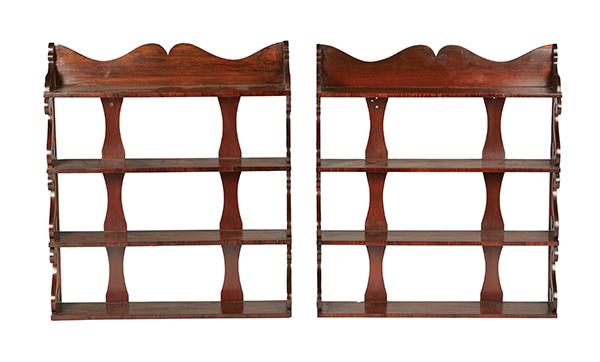 Appraisal: A PAIR OF REGENCY SIMULATED ROSEWOOD OPEN PINE WALL MOUNTED