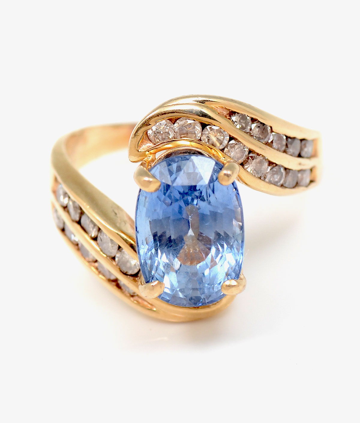 Appraisal: K CTW SAPPHIRE DIAMOND RING K yellow gold ring contains