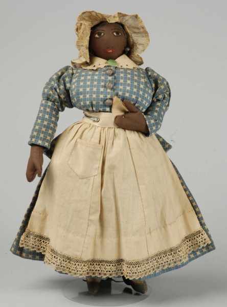 Appraisal: Vintage Black Cloth Lady Dolls Description All brown cloth with