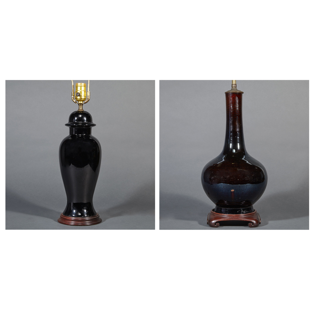 Appraisal: Two Chinese Black Glazed Porcelain Vases th Century Each drilled